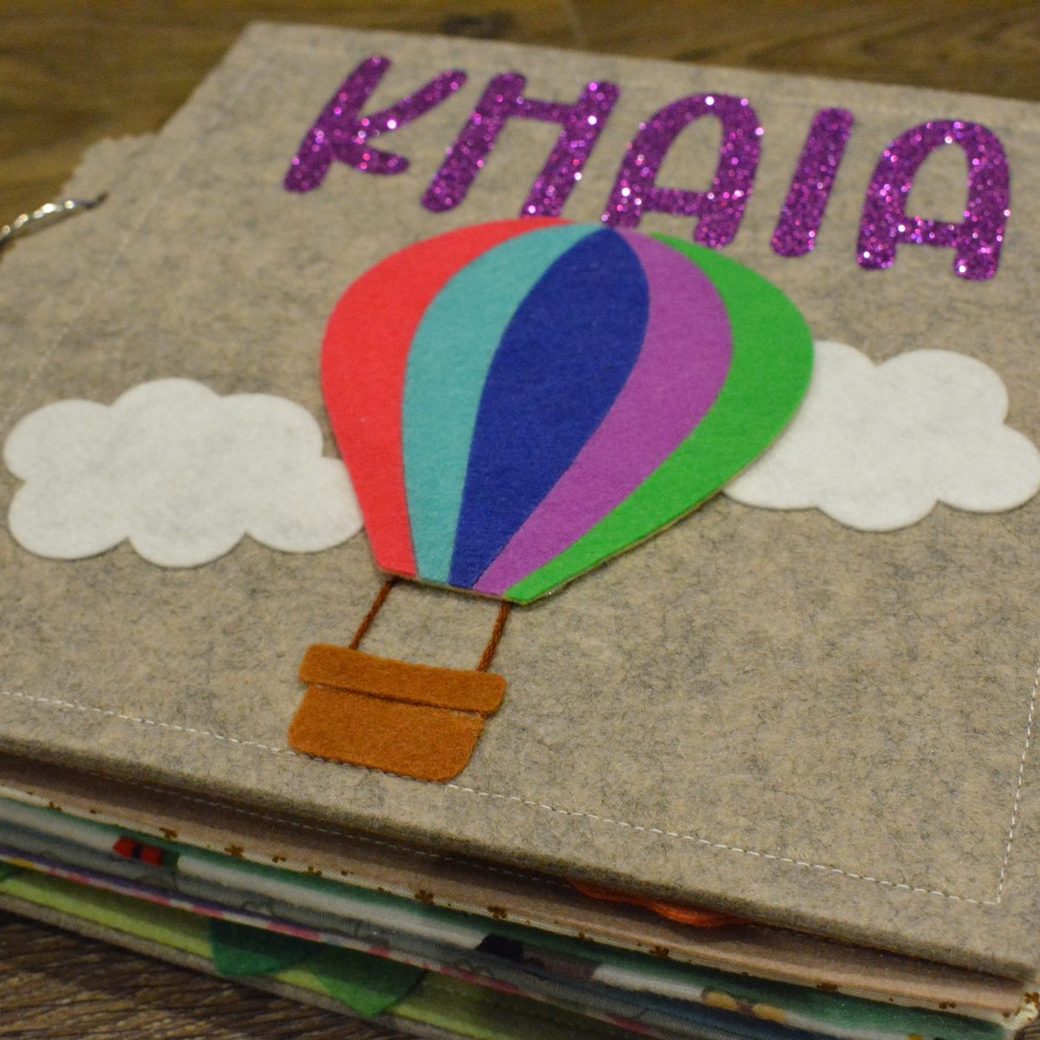 A hot air balloon cover. The design changes with the child.